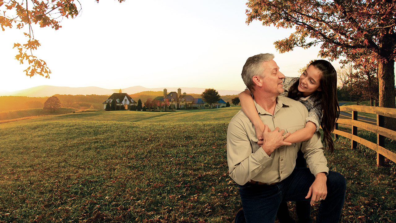 Father with his daughter at their farm
